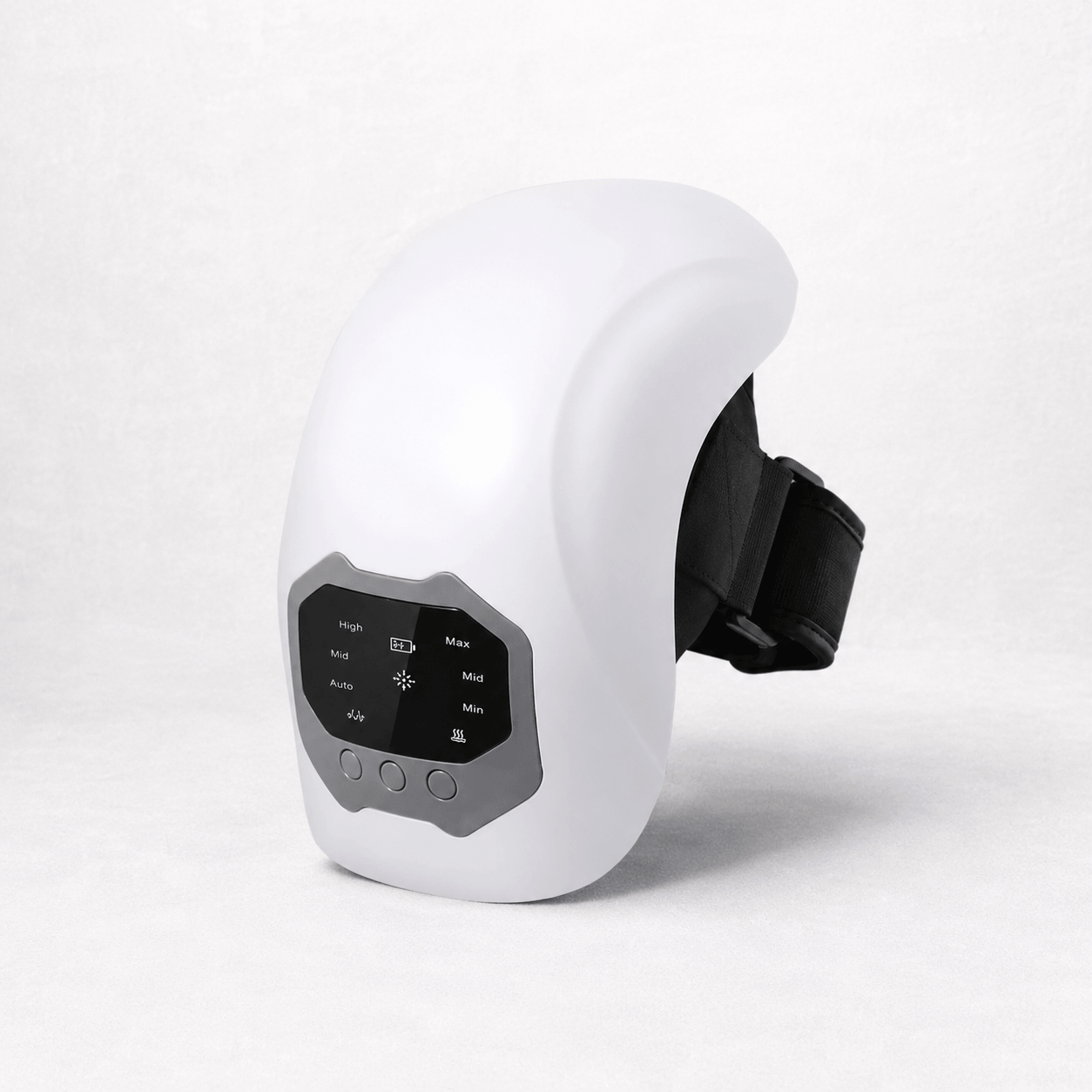 Cordless knee massager device with control panel for adjustable heat and massage settings.
